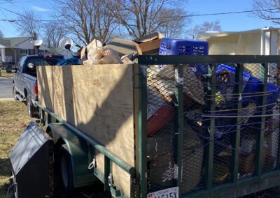 An image of our trailer full of junk during one of our junk hauling services in frederick md.