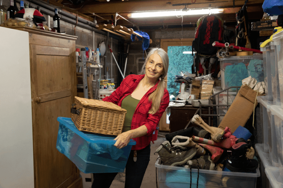 A woman carrying a couple of baskets as she prepares for maryland junk removal
